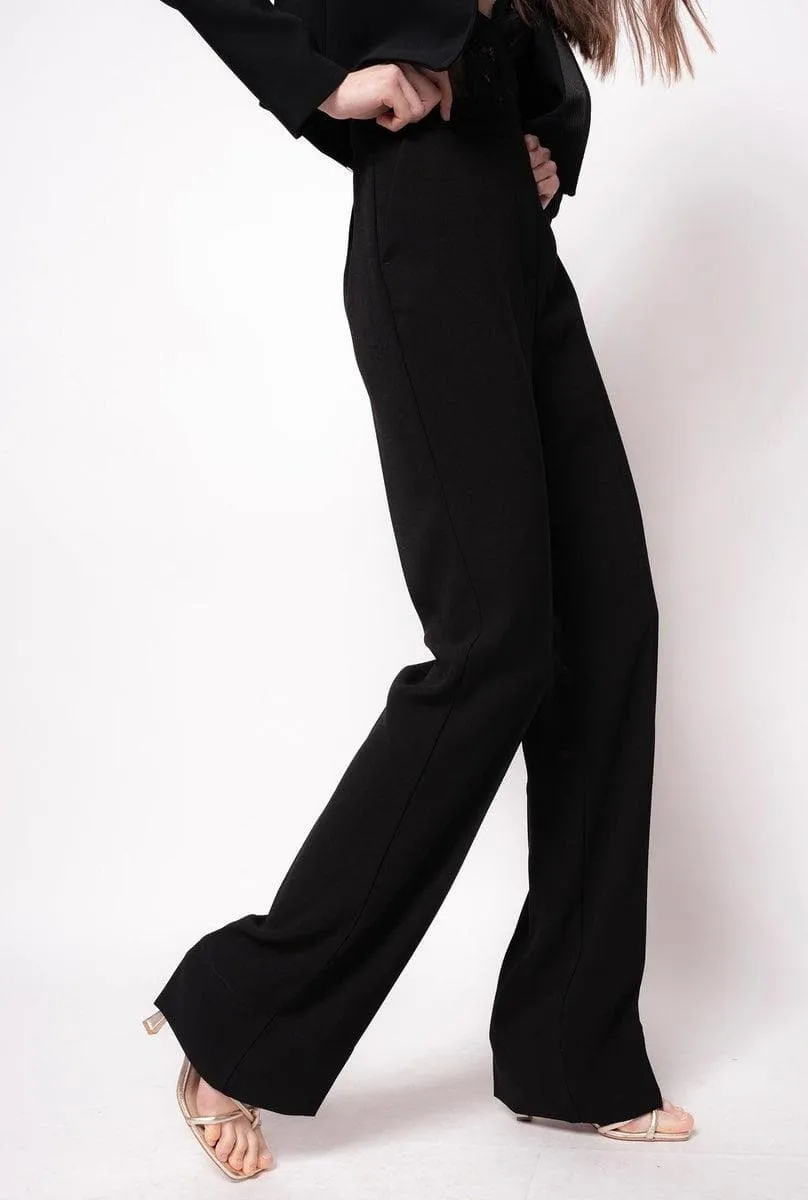 Pantaloni flared in poly crêpe